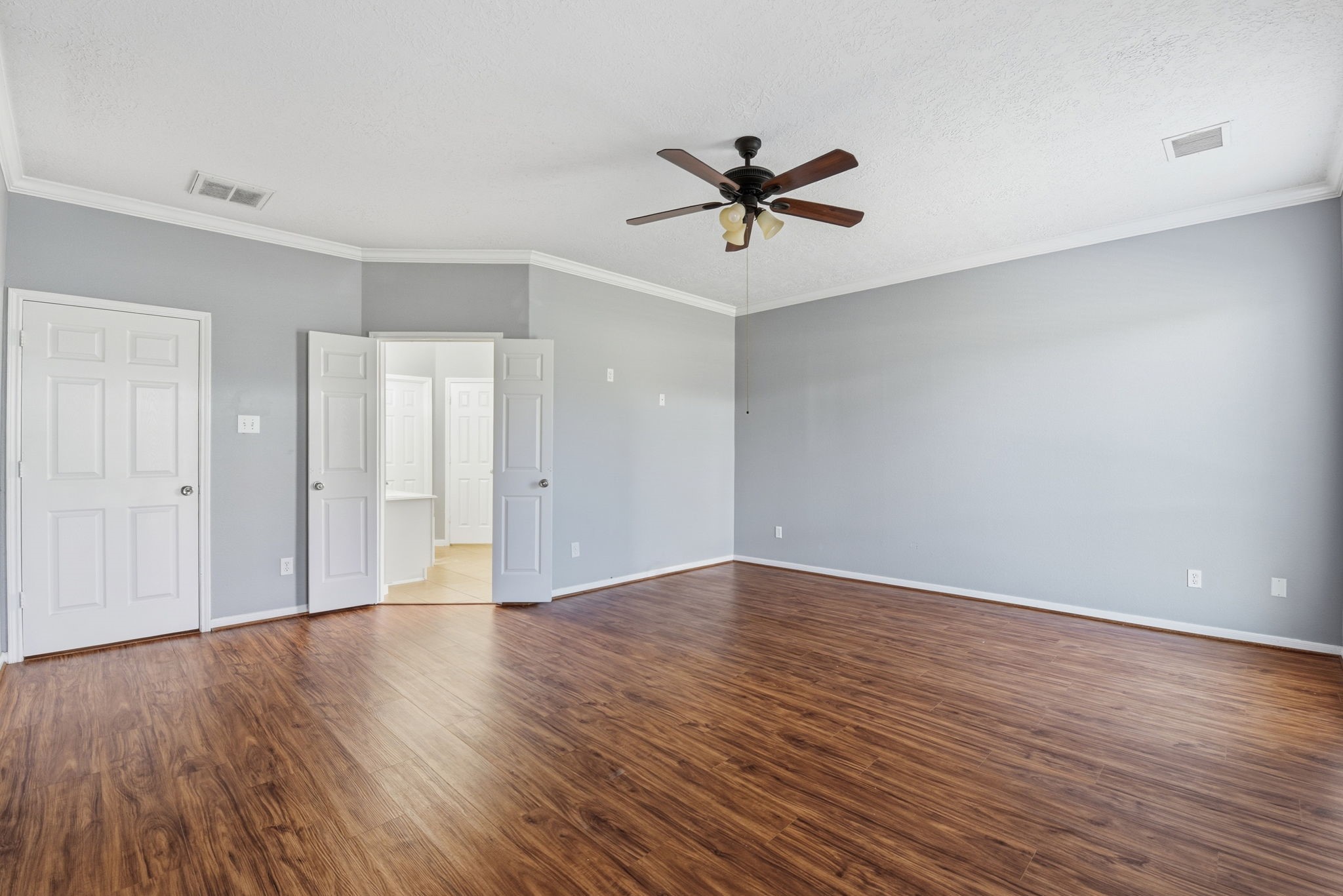 13902 Oneida Court Cypress, TX 77429 - Photo 25 of 48 a view of an empty room with wooden floor