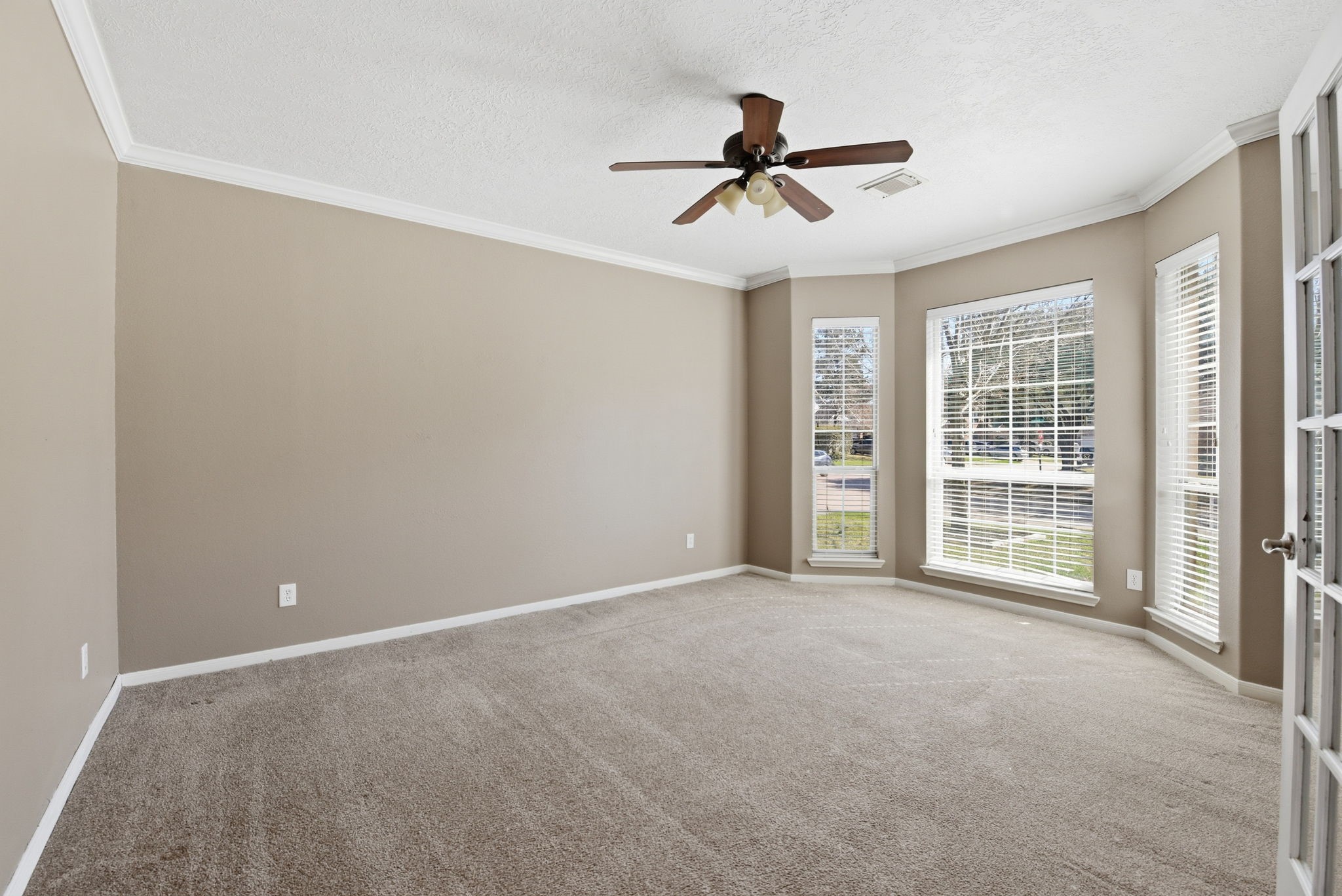 13902 Oneida Court Cypress, TX 77429 - Photo 30 of 48 a view of a livingroom with a ceiling fan and window