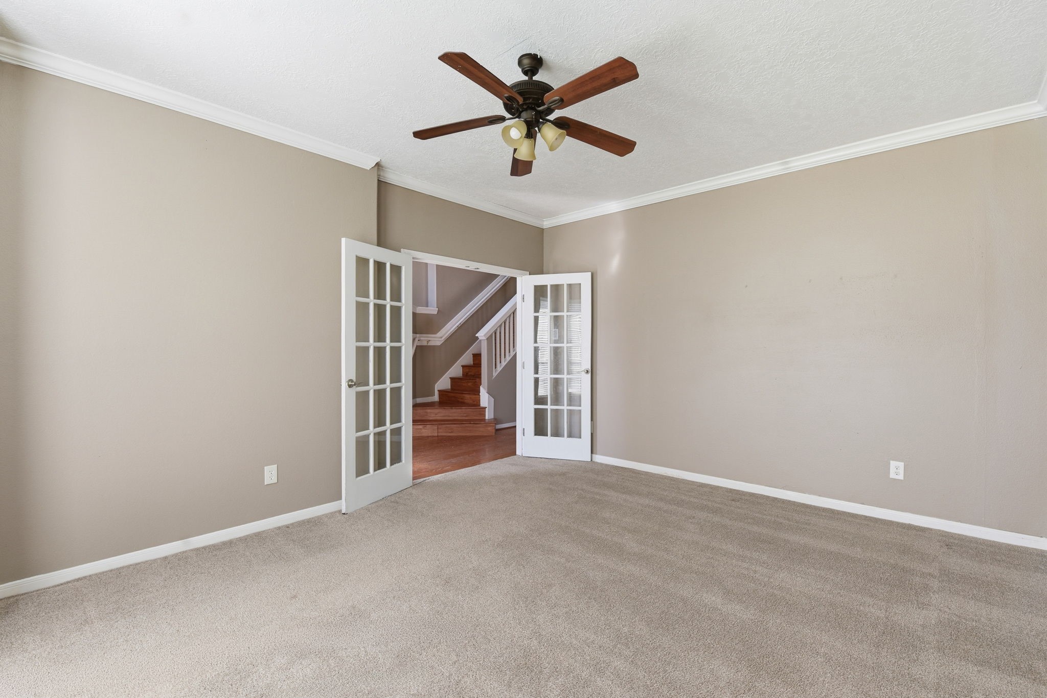 13902 Oneida Court Cypress, TX 77429 - Photo 31 of 48 an empty room with closet and ceiling fan