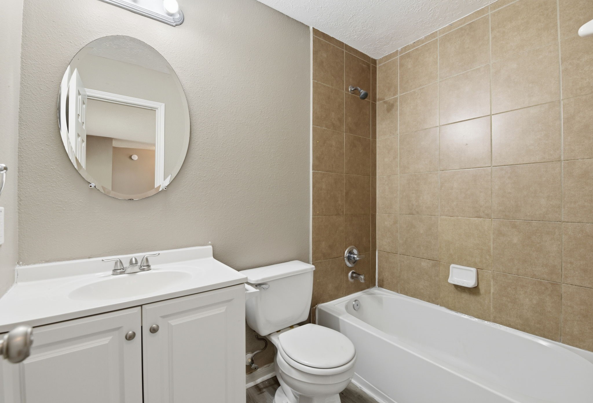 13902 Oneida Court Cypress, TX 77429 - Photo 39 of 48 a bathroom with a sink a toilet and shower