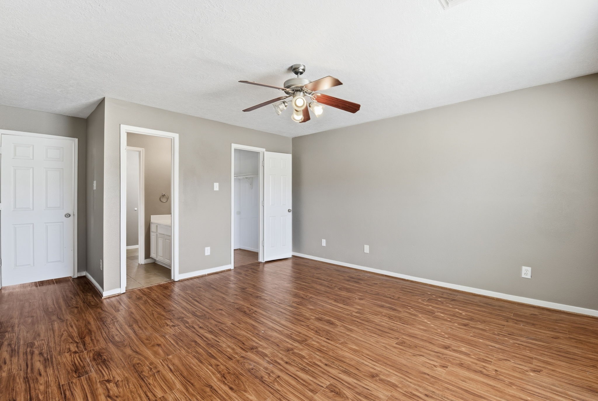 13902 Oneida Court Cypress, TX 77429 - Photo 44 of 48 a view of an empty room with wooden floor