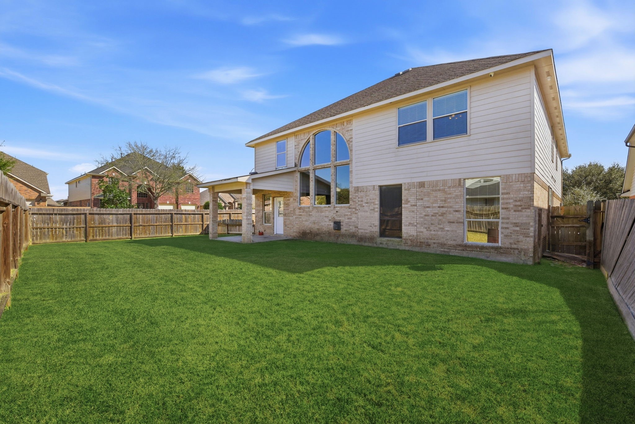 13902 Oneida Court Cypress, TX 77429 - Photo 46 of 48 a view of a house with a backyard