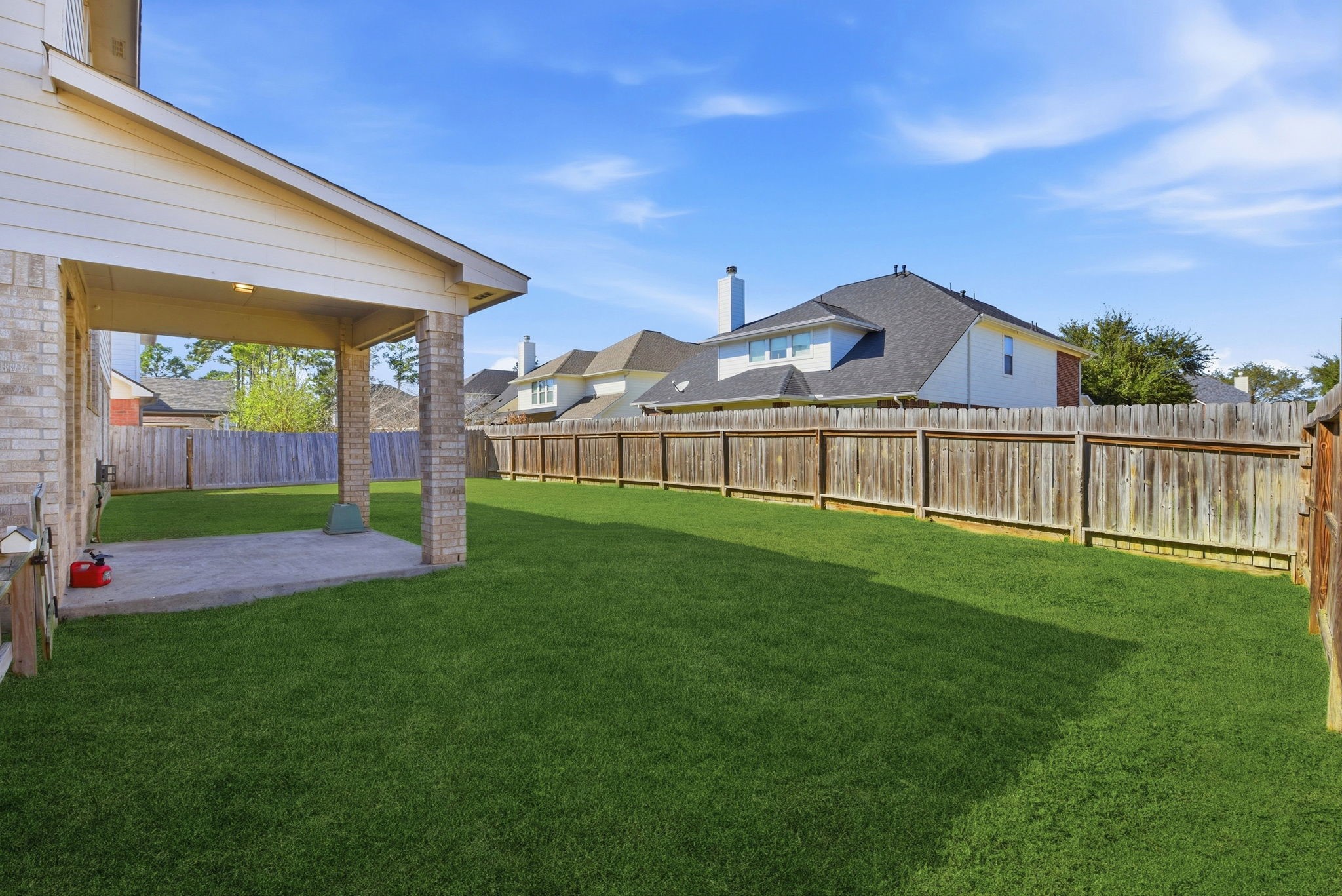 13902 Oneida Court Cypress, TX 77429 - Photo 48 of 48 a view of an house with backyard and porch