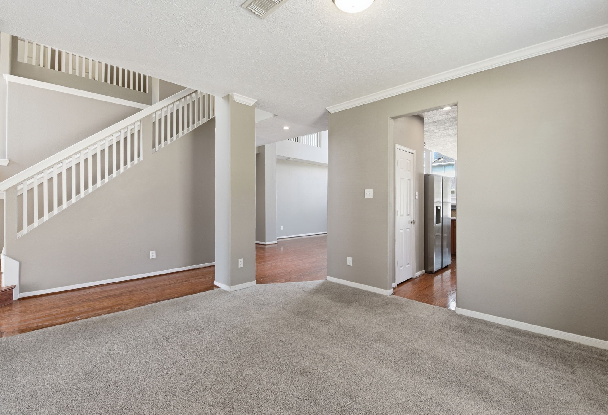 13902 Oneida Court Cypress, TX 77429 - Photo 9 of 48 a view of an empty room with stairs