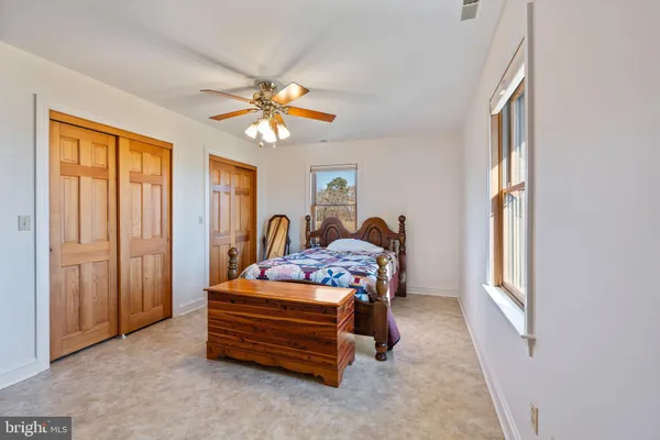 a view of an empty room with a large window
