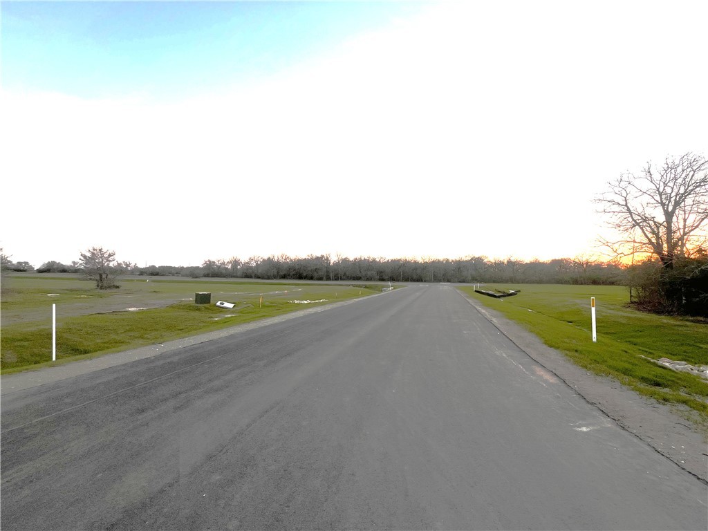 2425 Coronado Estates Drive Bryan, TX 77808 - Photo 13 of 44 a view of a lake with a big yard