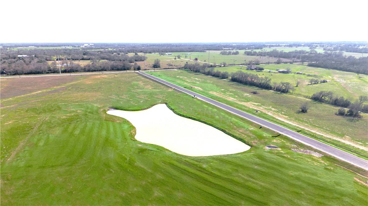 2425 Coronado Estates Drive Bryan, TX 77808 - Photo 30 of 44 a view of a swimming pool with a garden