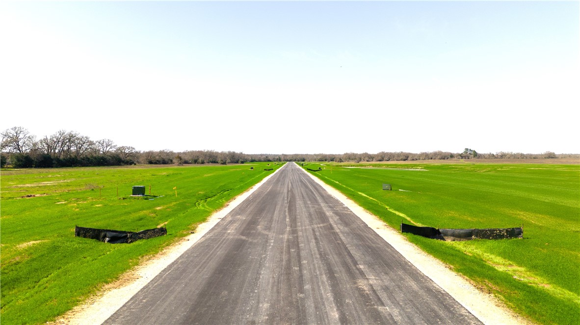 2425 Coronado Estates Drive Bryan, TX 77808 - Photo 35 of 44 a view of a lake with a big yard