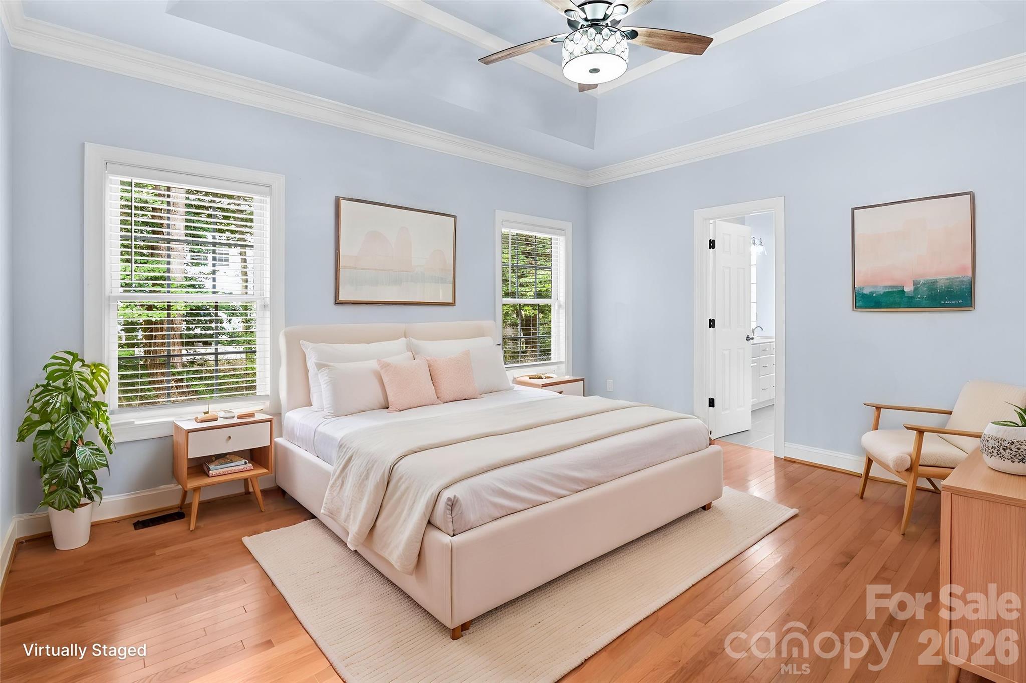 321 Forbes Court Clover, SC 29710 - Photo 12 of 31 a spacious bedroom with a bed and a chandelier