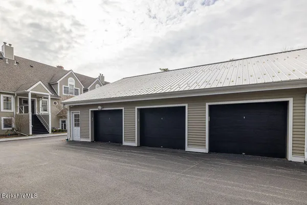 swimming pool with outdoor seating and yard