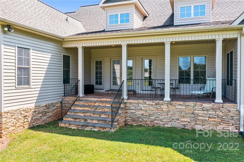 356 Greenhill Road Mocksville, NC 27028 - Photo 11 of 46 a view of a brick house with a yard