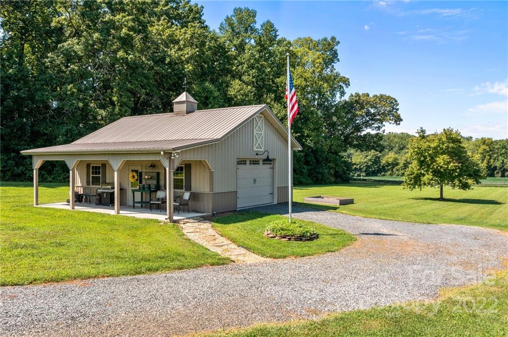 356 Greenhill Road Mocksville, NC 27028 - Photo 12 of 46 a view of a house with a yard and sitting area