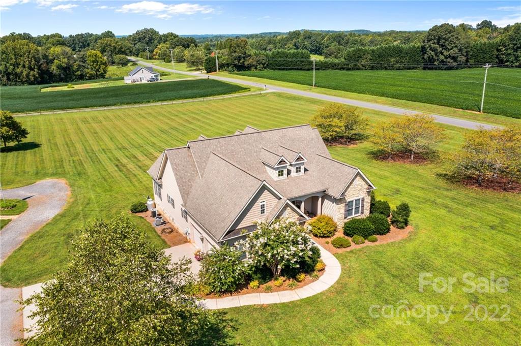 356 Greenhill Road Mocksville, NC 27028 - Photo 16 of 46 an aerial view of a house with a yard and outdoor seating