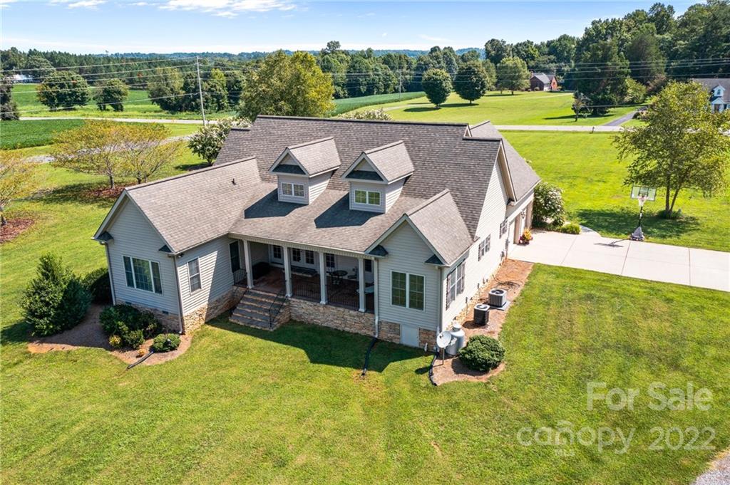 356 Greenhill Road Mocksville, NC 27028 - Photo 20 of 46 a view of a house with big yard and a large pool