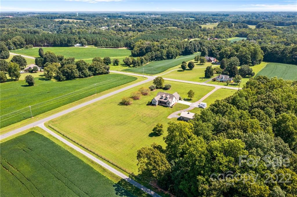 356 Greenhill Road Mocksville, NC 27028 - Photo 23 of 46 an aerial view of a residential houses with outdoor space and city view