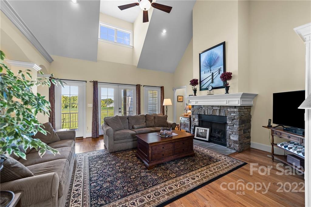 356 Greenhill Road Mocksville, NC 27028 - Photo 26 of 46 a living room with furniture a flat screen tv and a fireplace