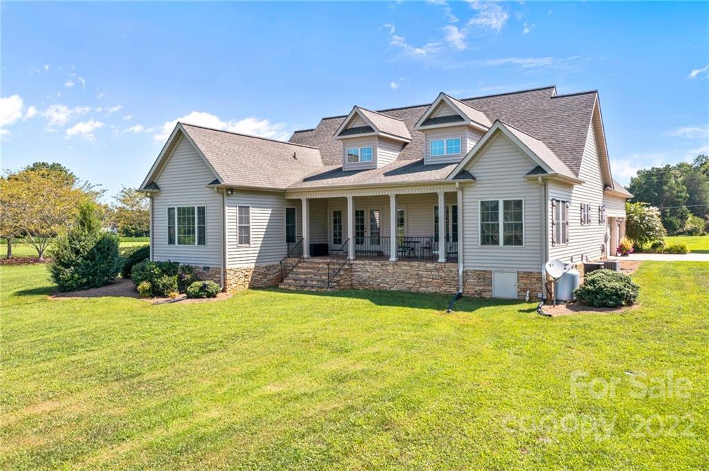 356 Greenhill Road Mocksville, NC 27028 - Photo 3 of 46 a view of a house with swimming pool and a yard