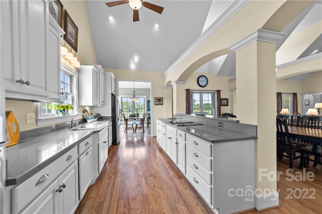 356 Greenhill Road Mocksville, NC 27028 - Photo 34 of 46 a kitchen with stainless steel appliances granite countertop a stove and cabinets