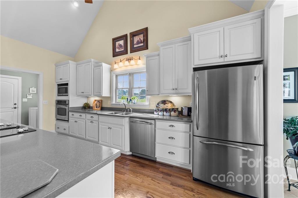 356 Greenhill Road Mocksville, NC 27028 - Photo 35 of 46 a kitchen with stainless steel appliances a refrigerator sink and cabinets