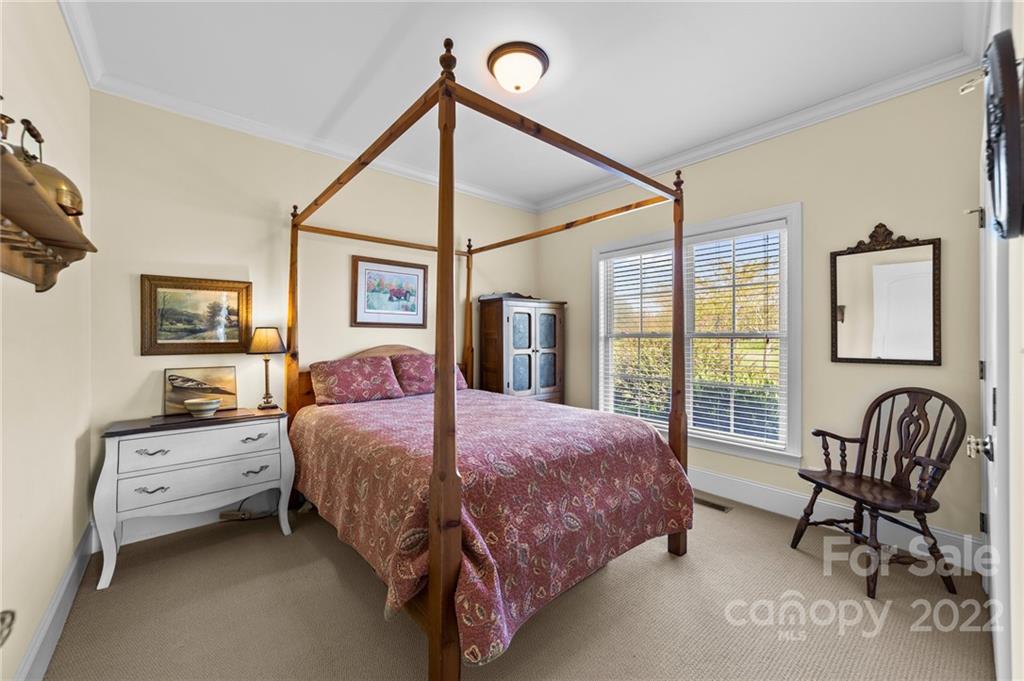 356 Greenhill Road Mocksville, NC 27028 - Photo 40 of 46 a bedroom with a bed chair and window