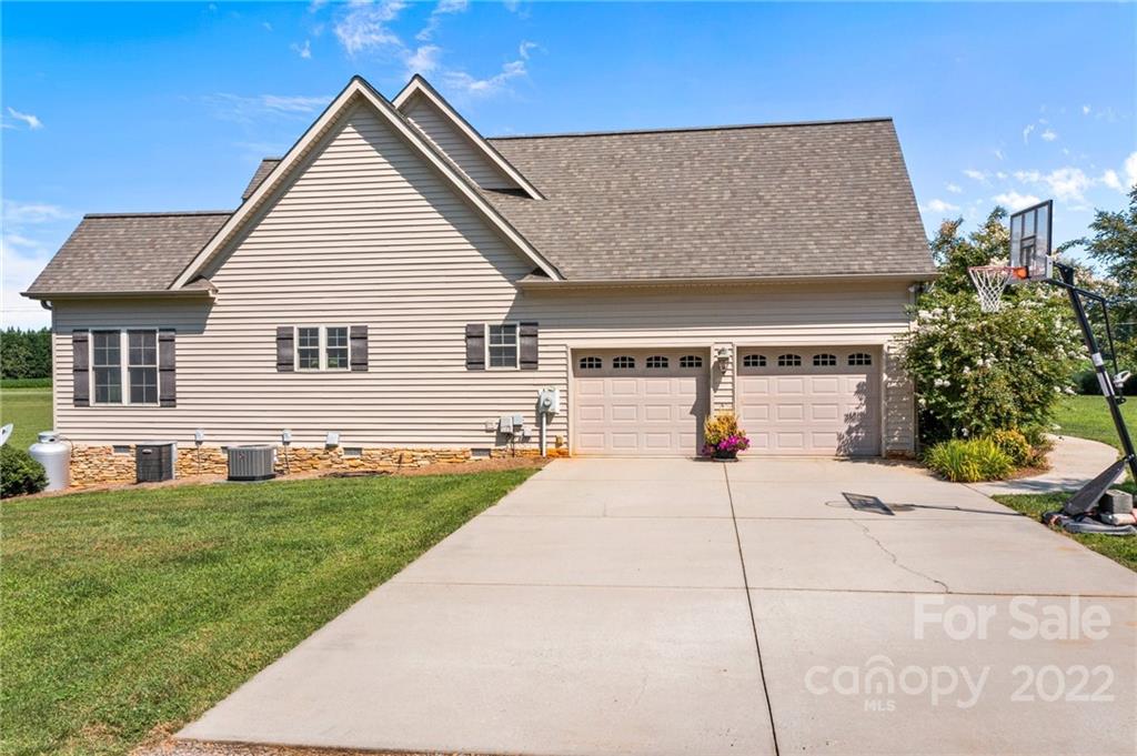 356 Greenhill Road Mocksville, NC 27028 - Photo 9 of 46 a view of a house with backyard porch and sitting area