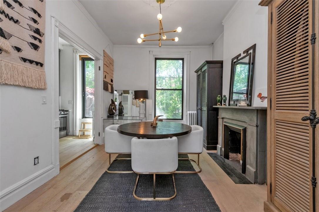 196 Decatur Street Brooklyn, NY 11233 - Photo 2 of 20 a view of a dining room with furniture window and wooden floor