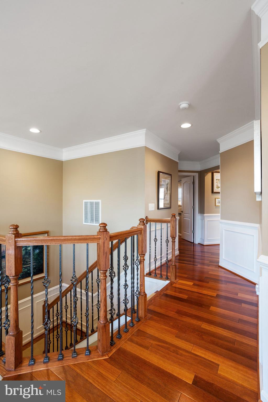23372 Minerva Drive Brambleton, VA 20148 - Photo 24 of 52 Stairway third level, beautiful hallway hardwood