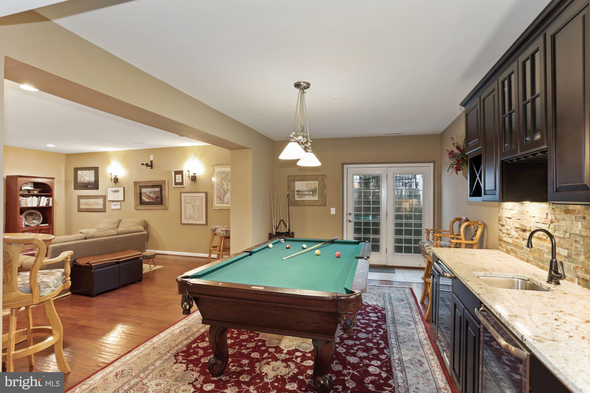 23372 Minerva Drive Brambleton, VA 20148 - Photo 39 of 52 Wet Bar, wine cooler & fridge