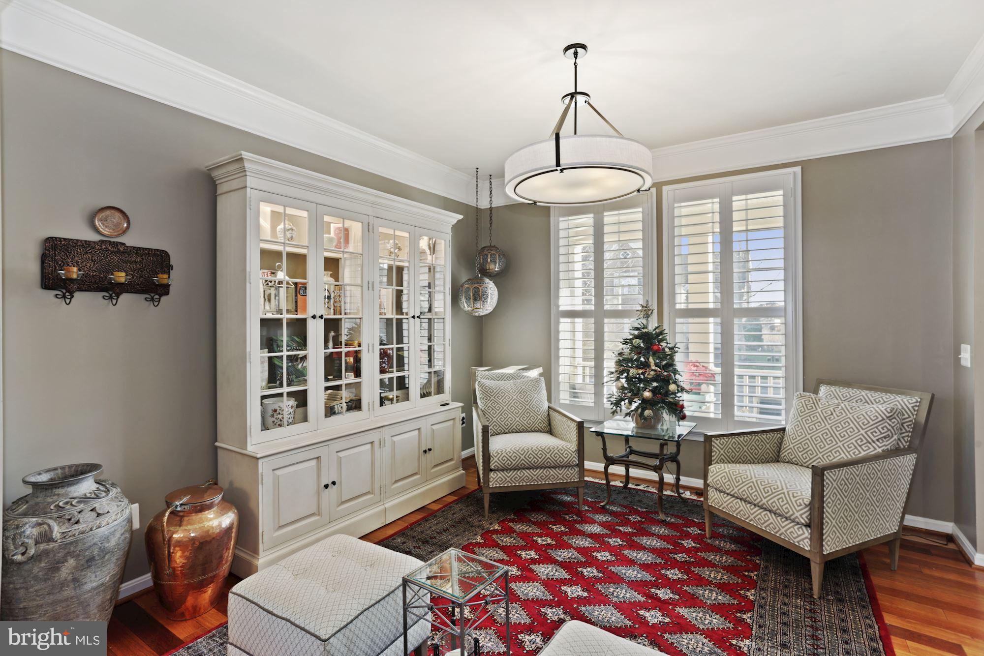 23372 Minerva Drive Brambleton, VA 20148 - Photo 5 of 52 Living Room, beautiful crown molding
