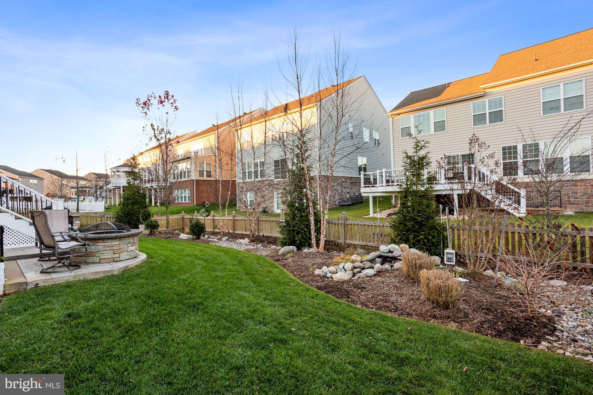 23372 Minerva Drive Brambleton, VA 20148 - Photo 50 of 52 Extensive backyard landscaping with water feature
