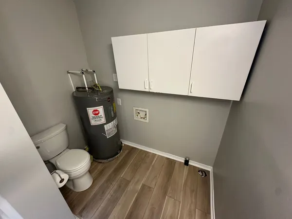 a bathroom with a toilet and a sink