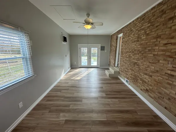 a view of an empty room and window