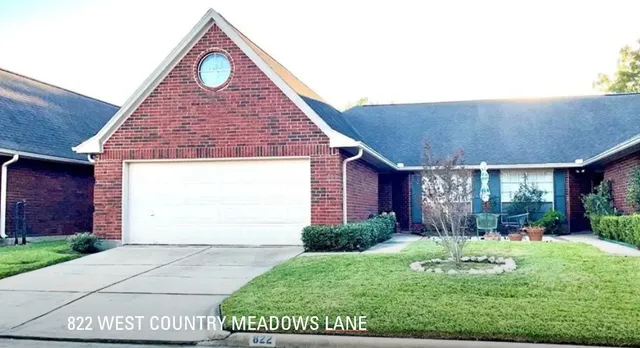 a house view with a outdoor space