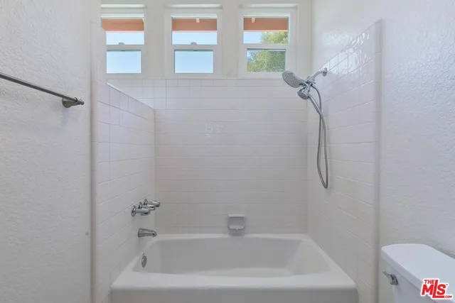 a bathroom with a bathtub