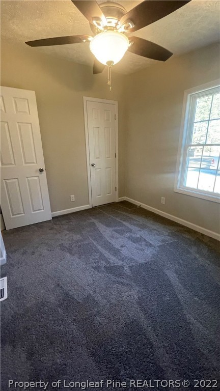 7050 Faircloth Bridge Road Stedman, NC 28391 - Photo 17 of 21 a view of an empty room with a window
