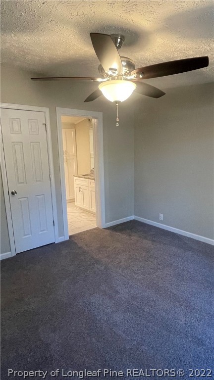 7050 Faircloth Bridge Road Stedman, NC 28391 - Photo 8 of 21 a view of an empty room with a chandelier fan