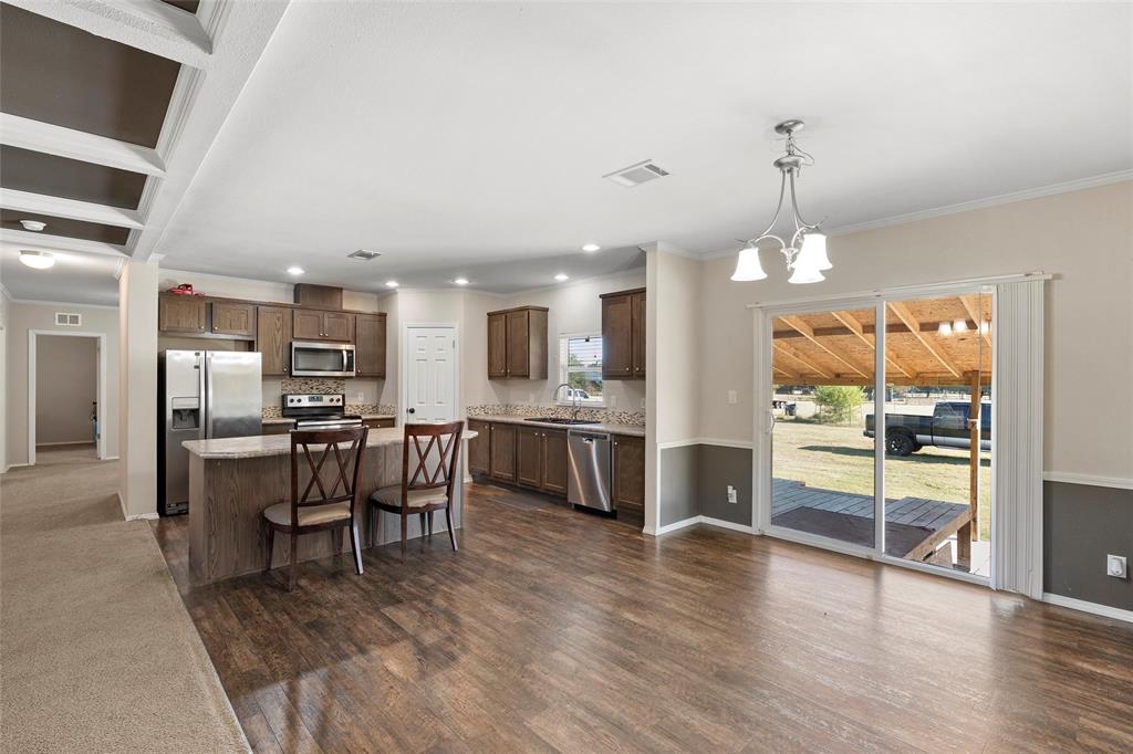 1605 Cloverleaf Road Bellmead, TX 76705 - Photo 10 of 29 a view of a kitchen and dining room
