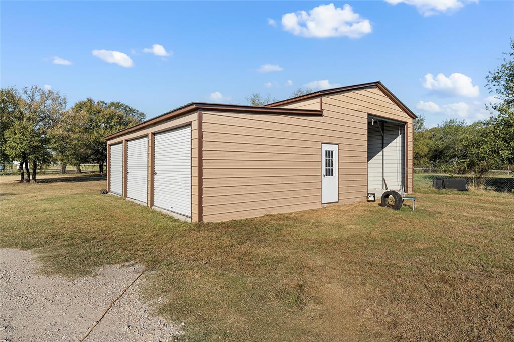 1605 Cloverleaf Road Bellmead, TX 76705 - Photo 25 of 29 a view of a house with a backyard