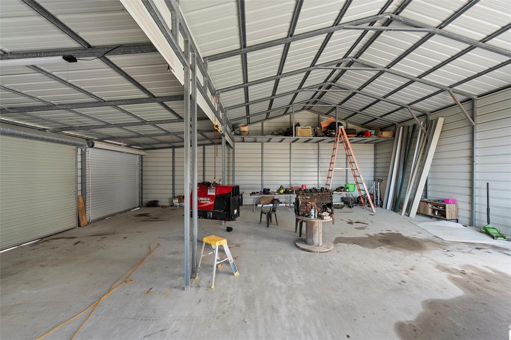 1605 Cloverleaf Road Bellmead, TX 76705 - Photo 26 of 29 a view of a room with gym equipment