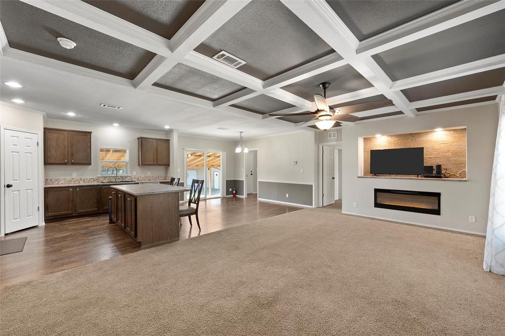 1605 Cloverleaf Road Bellmead, TX 76705 - Photo 27 of 29 a view of a kitchen with a sink and a microwave
