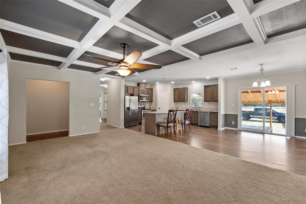 1605 Cloverleaf Road Bellmead, TX 76705 - Photo 8 of 29 a view of a projector room with wooden floor