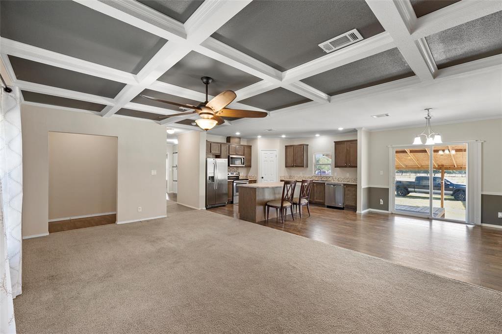 1605 Cloverleaf Road Bellmead, TX 76705 - Photo 9 of 29 a view of a projector room with wooden floor