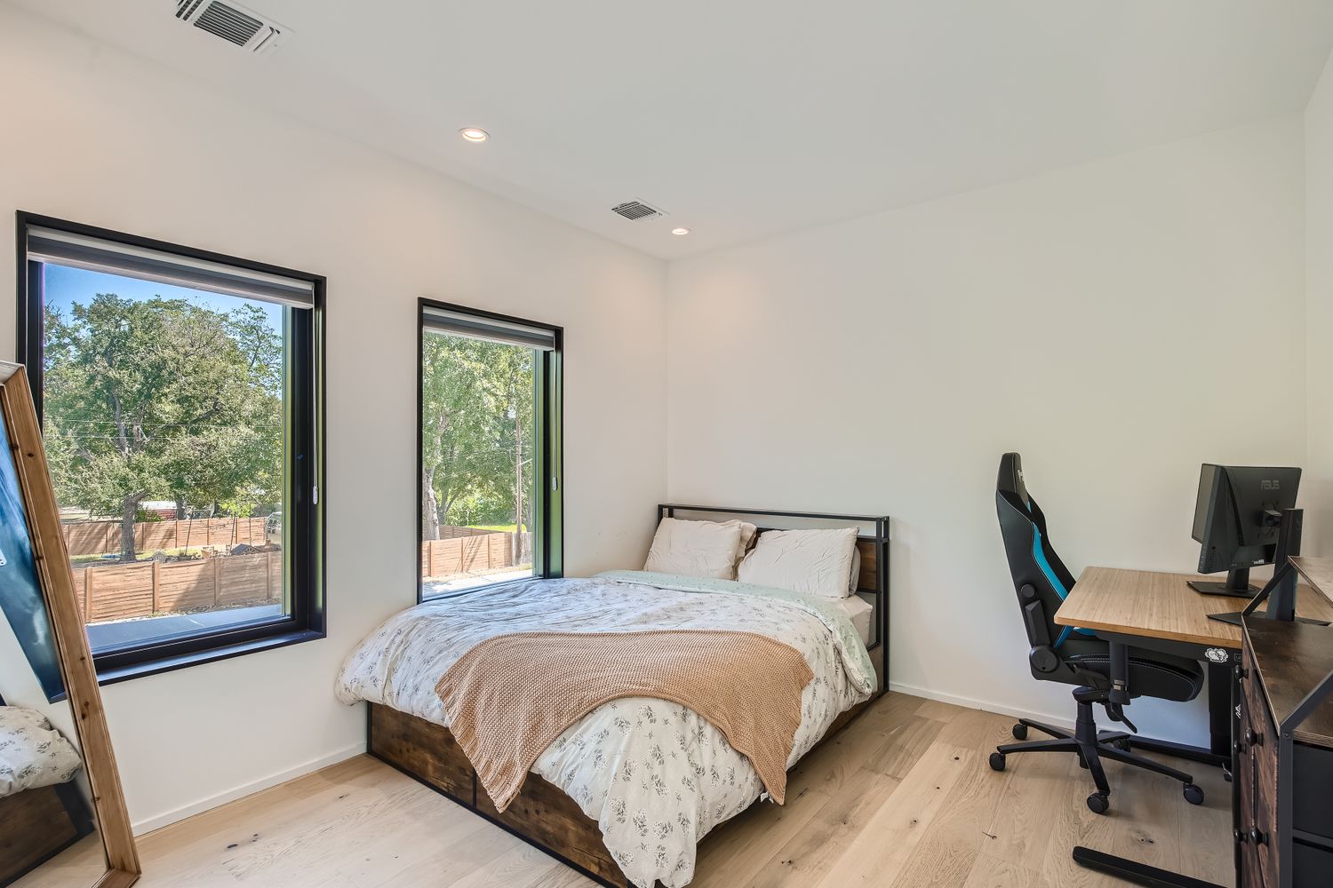 7525 Delafield Lane, Unit A Austin, TX 78752 - Photo 25 of 33 Bedroom featuring a desk, light wood-style flooring, and recessed lighting