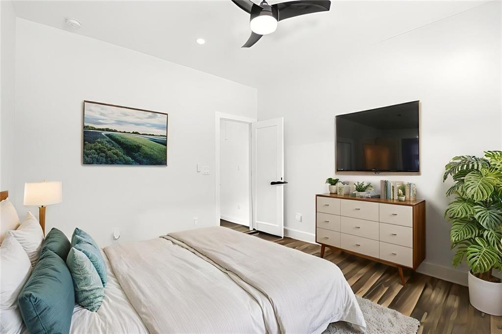 2014 Cambridge Avenue Atlanta, GA 30337 - Photo 19 of 34 a bedroom with a bed and a flat screen tv