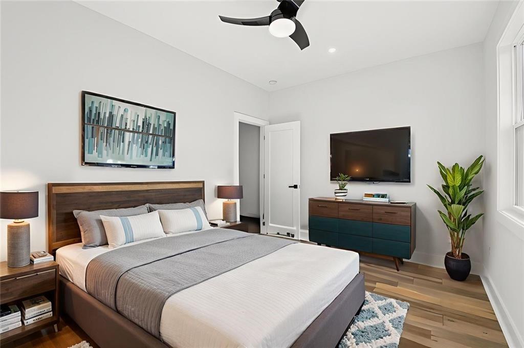 2014 Cambridge Avenue Atlanta, GA 30337 - Photo 22 of 34 a bedroom with a bed and a flat screen tv