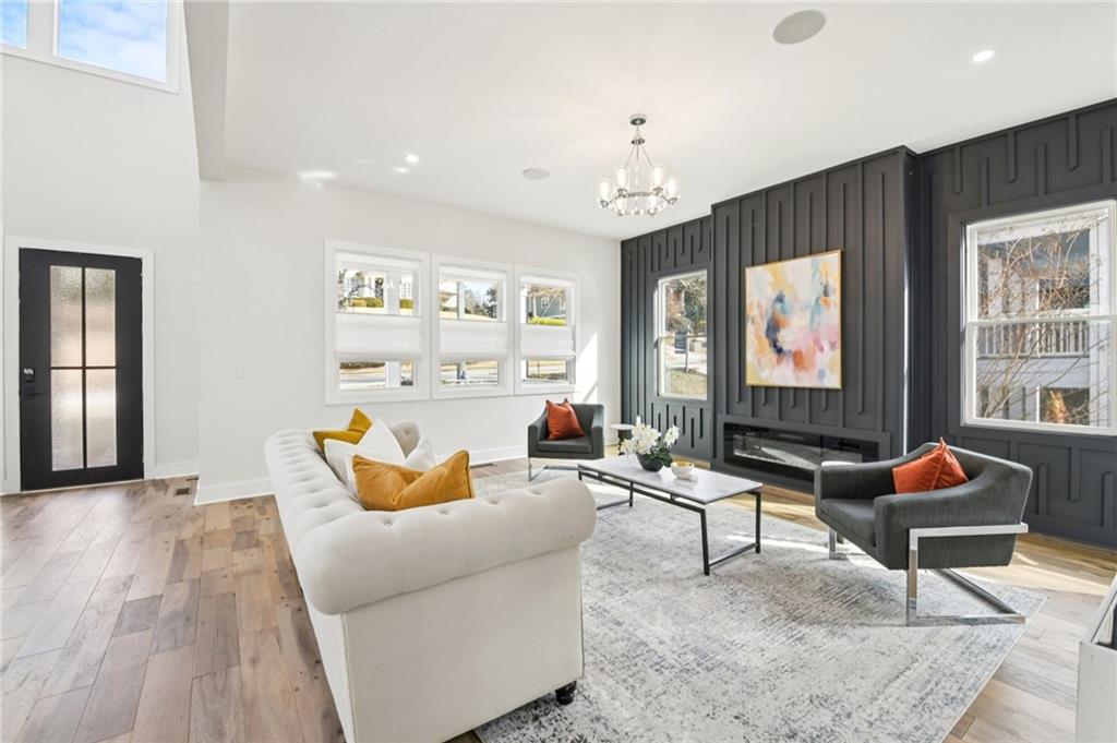 2014 Cambridge Avenue Atlanta, GA 30337 - Photo 3 of 34 a living room with furniture and a flat screen tv