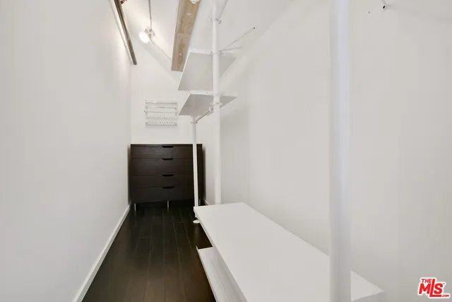 a view of a hallway with staircase