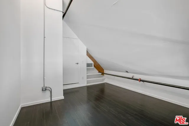 a view of entryway with wooden floor