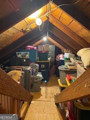 a view of a deck with wooden fence