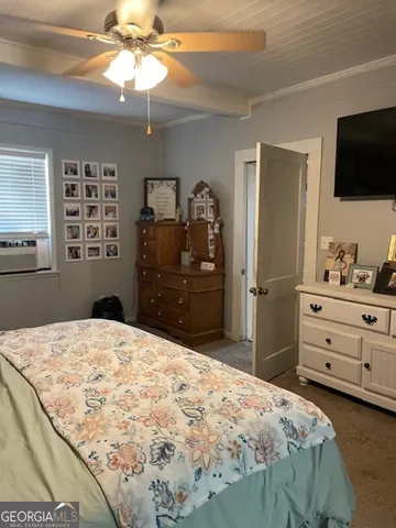 a bathroom with a mirror and a sink